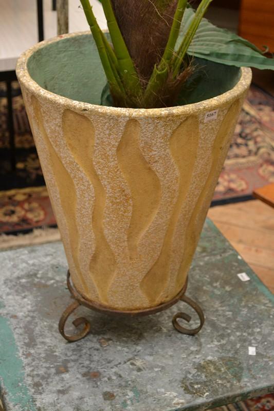 Appraisal: A 'S YELLOW TEXTURAL CONCRETE PLANTER ON WROUGHT IRON BASE