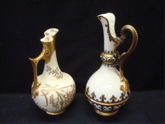 Appraisal: Two ROYAL WORCESTER Ewers -cream background with floral decoration high