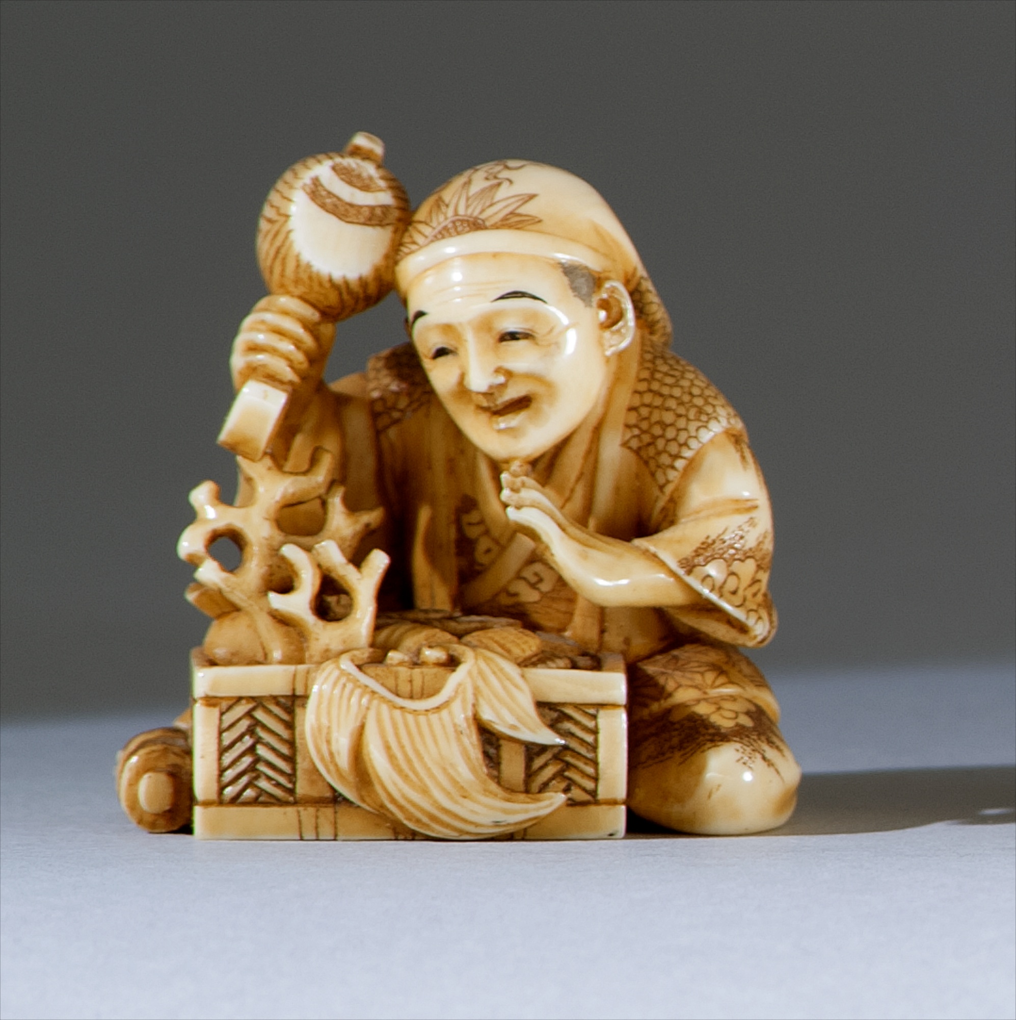 Appraisal: IVORY NETSUKE Mid- th CenturyBy Shugyoku In the form of