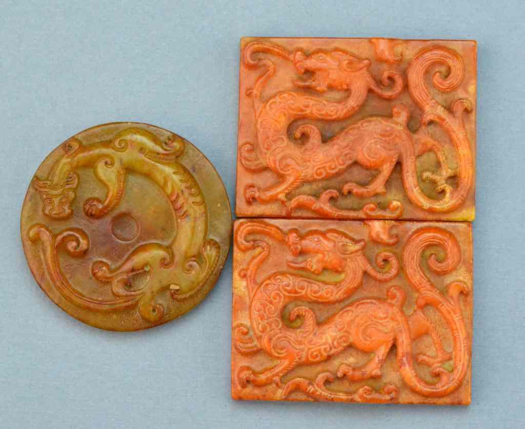 Appraisal: Chinese Carved Jade PlaquesFinely carved in the archaic style to