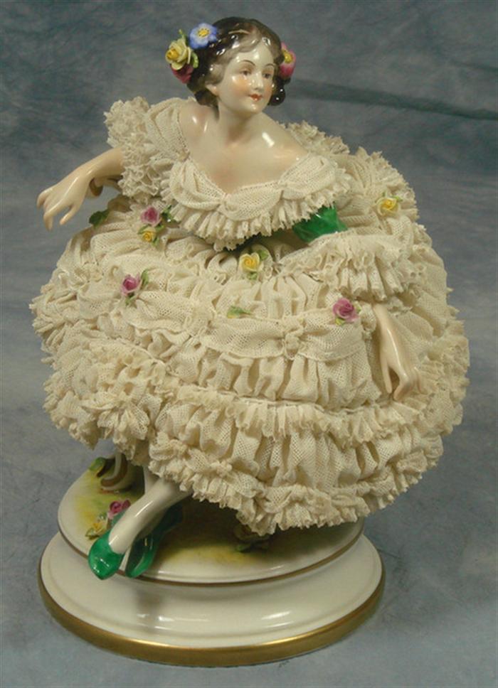 Appraisal: Dresden porcelain figurine lady seated on chair in lace dress