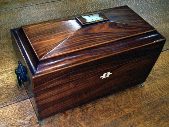 Appraisal: A late th Century Sheraton period mahogany sarcophagus shaped tea