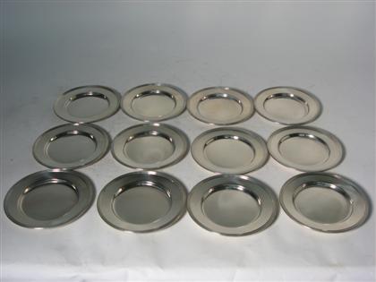 Appraisal: Twelve matching sterling silver bread plates th century Plain with