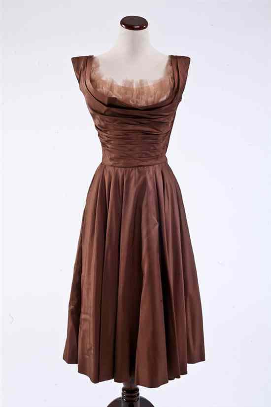 Appraisal: CEIL CHAPMAN SILK SATIN BROWN DRESS 's Full skirt with