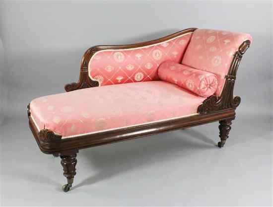 Appraisal: A William IV carved mahogany chaise longue with scroll frame