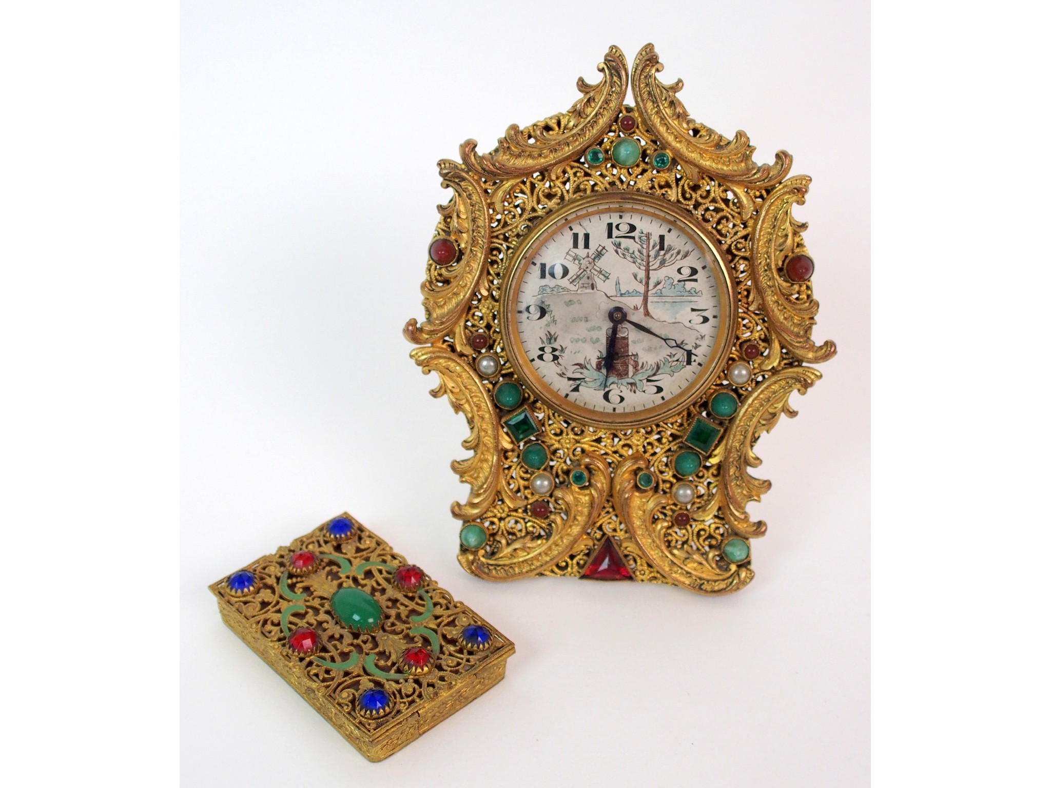 Appraisal: A French Brevete gilt metal filigree clock and associated mirrored