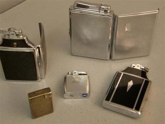 Appraisal: Two Ronson Art Deco lighter cigarette cases in black and