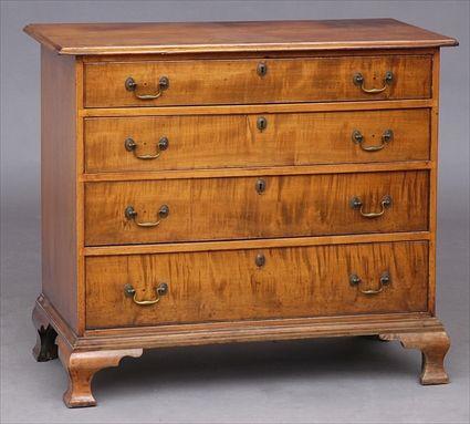 Appraisal: CHIPPENDALE MAPLE CHEST OF DRAWERS The molded top above drawers