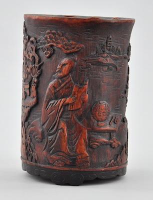 Appraisal: A Carved Bamboo Brush Pot Finished with a clear red