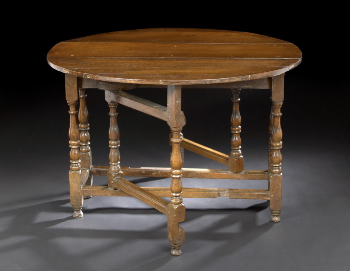 Appraisal: English Oak Gate-Leg Table second quarter th century the rounded