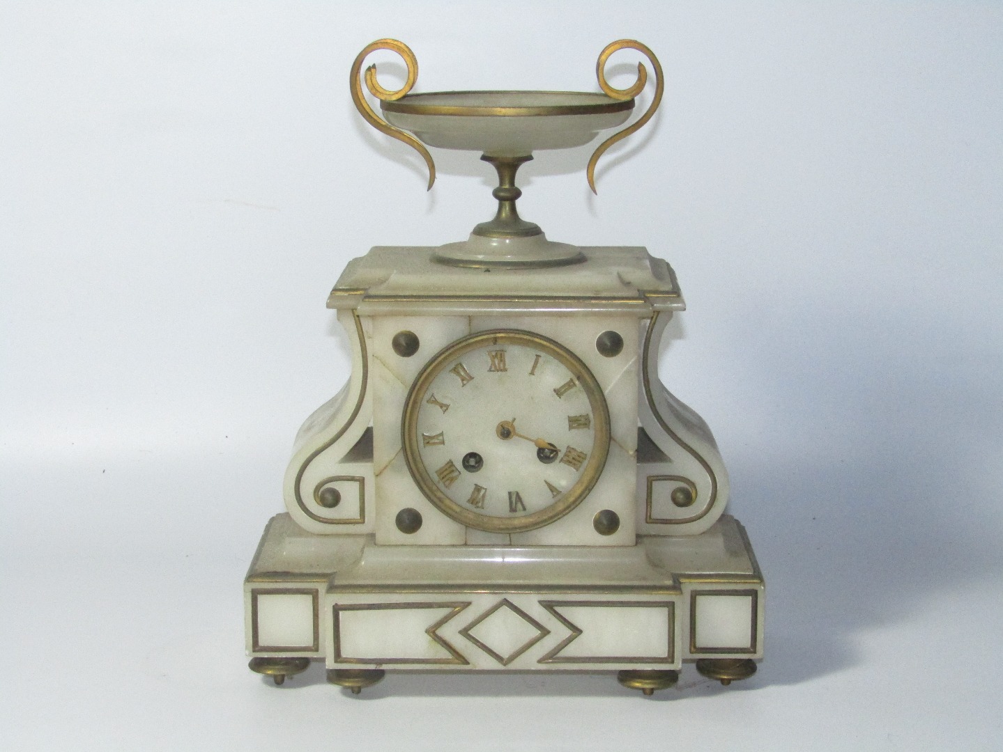 Appraisal: A thC French alabaster mantel clock with eight day movement