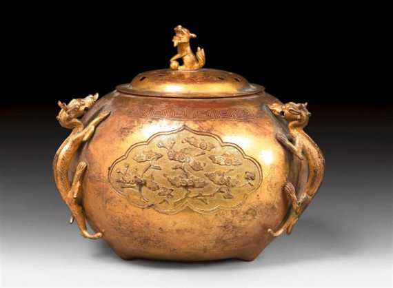 Appraisal: A GILT COPPER CENSER WITH THREE DRAGON HANDLES AND A