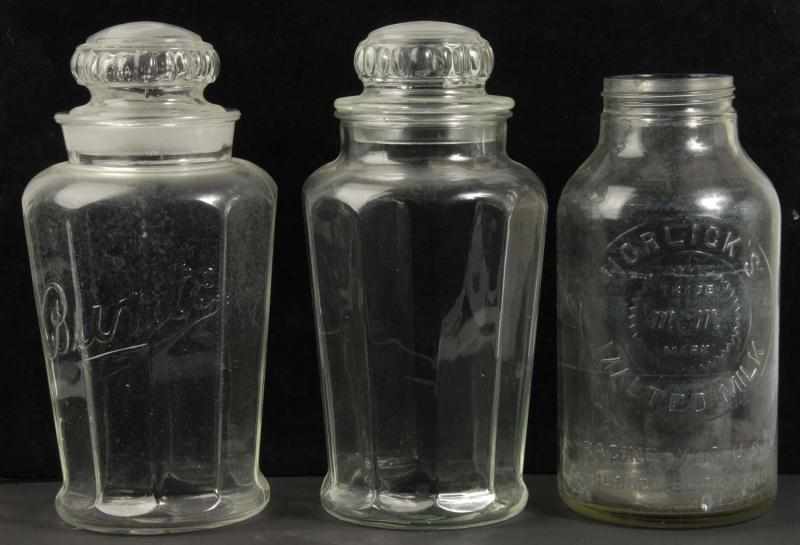 Appraisal: Lot of Glass Store Jars Description Includes one plain jar