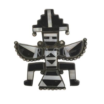 Appraisal: ZUNI KNIFE WING BROOCH Silver onyx and mother of pearl