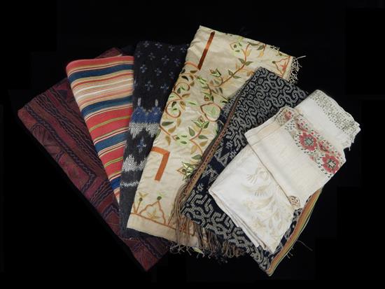 Appraisal: TEXTILES Ethnic themed blankets and table linens eight pieces th