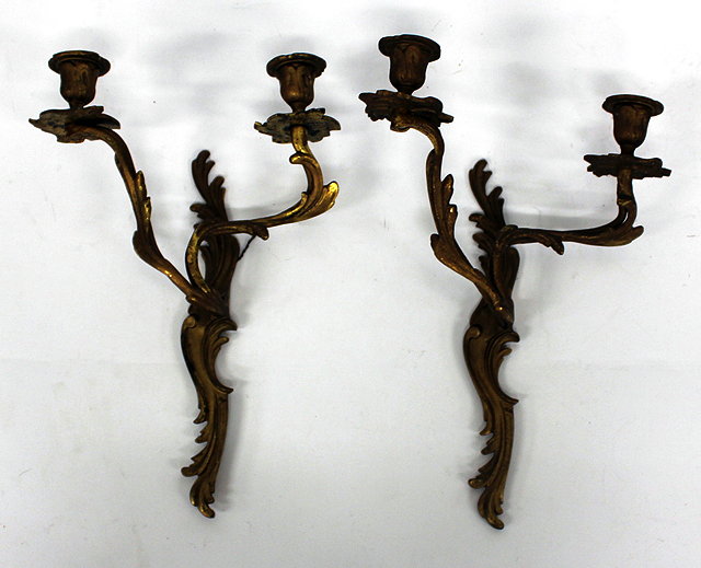 Appraisal: A PAIR OF GILT METAL TWO BRANCH CANDLE SCONCES of