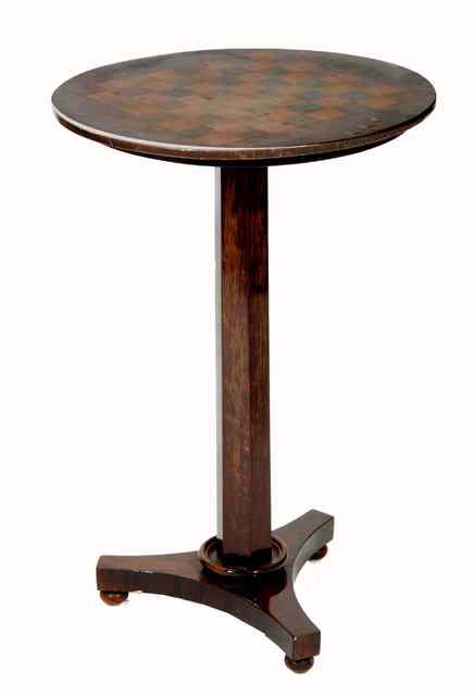 Appraisal: A VICTORIAN ROSEWOOD CHESS TABLE with circular top standing on