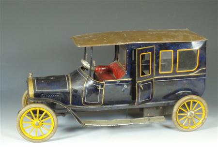 Appraisal: An impressive Bing RH Drive enamelled tinplate clockwork limousine taxi