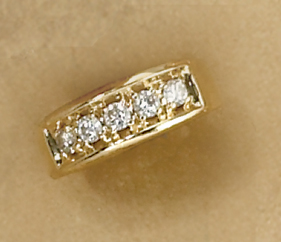 Appraisal: DIAMOND WEDDING RING Yellow gold band set with five round