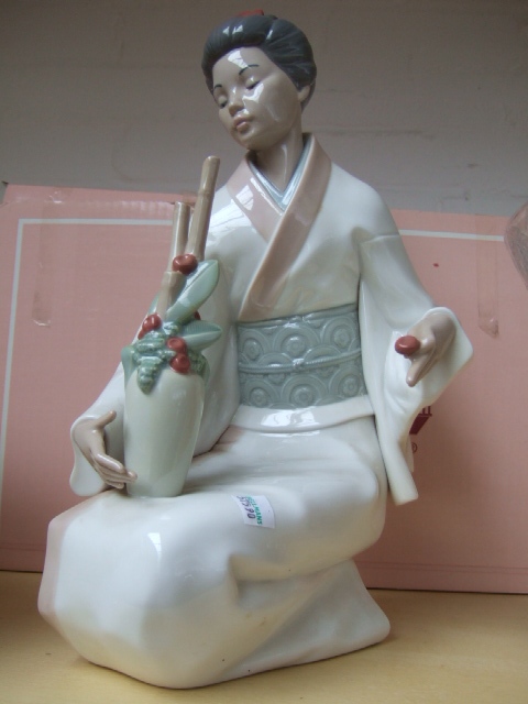 Appraisal: A Nao figure modelled as a Japanese figure in kneeling