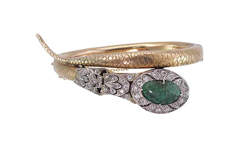 Appraisal: ANTIQUE EMERALD AND DIAMOND GOLD SNAKE BRACELET CA K yellow