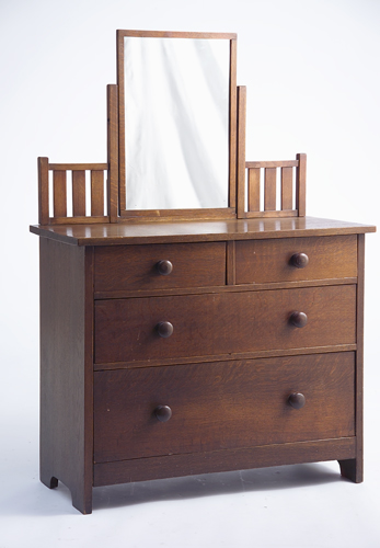 Appraisal: GUSTAV STICKLEY Child's dresser with drawers in two-over-two configuration round