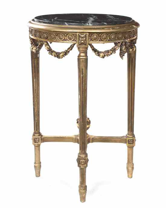 Appraisal: A Louis XVI Style Giltwood Gueridon having a circular marble