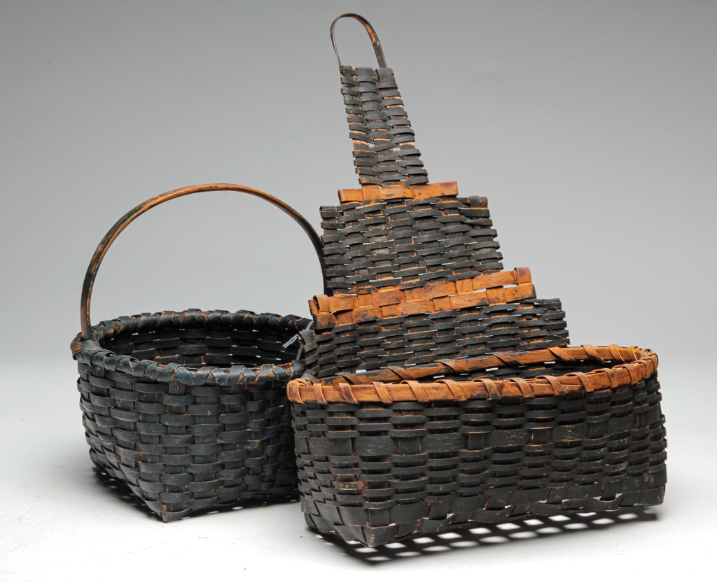 Appraisal: TWO AMERICAN BASKETS Twentieth century Woven splint and bentwood handles