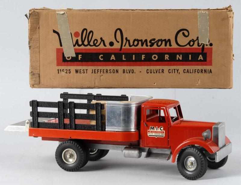 Appraisal: Pressed Steel Smith-Miller MIC Stake Truck Toy Description American Comes