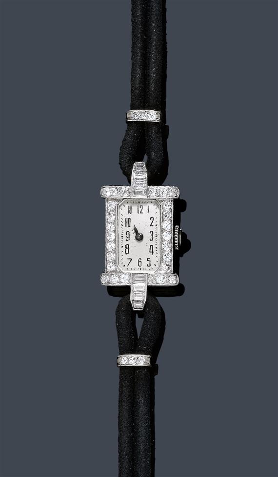 Appraisal: DIAMOND LADY'S WRISTWATCH France ca Platinum Rectangular lateral florally engraved