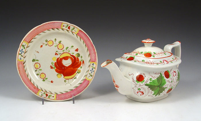 Appraisal: SOFT PASTE TEAPOT AND PLATE Hand painted Strawberry teapot ''h