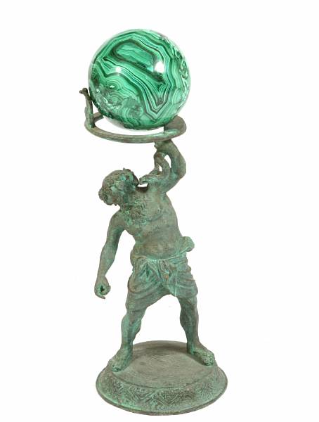 Appraisal: A patinated bronze figure of Silenus supporting malachite veneered orb