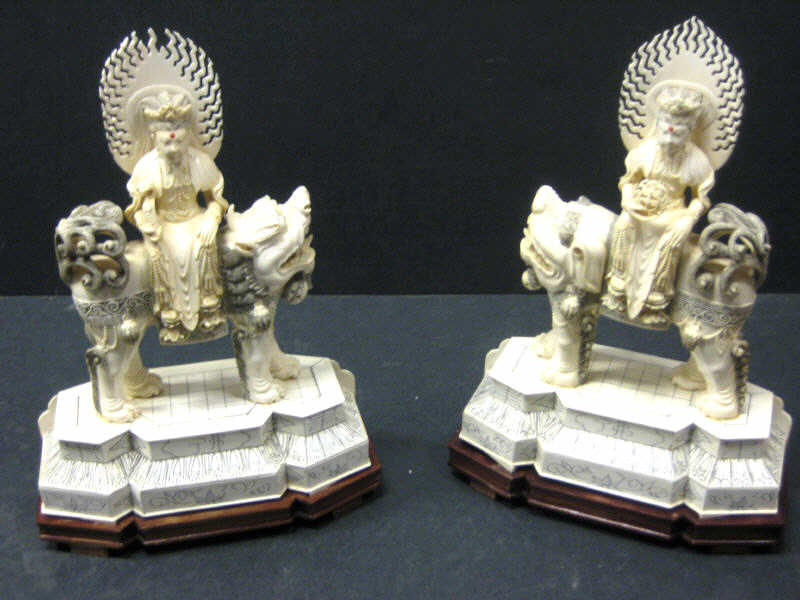 Appraisal: PAIR OF CHINESE CARVED IVORY FIGURE GROUPS Each depicting Bodhisattva