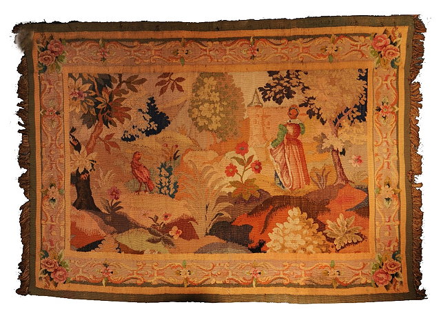 Appraisal: A FLEMISH STYLE TAPESTRY PANEL with figure in a garden