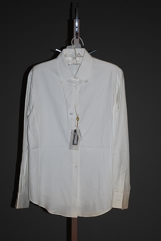 Appraisal: Loro Piana white cotton long sleeved blouse with shirt collar