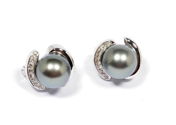 Appraisal: TAHITI PEARL AND DIAMOND EAR CLIPS White gold Casual-elegant ear