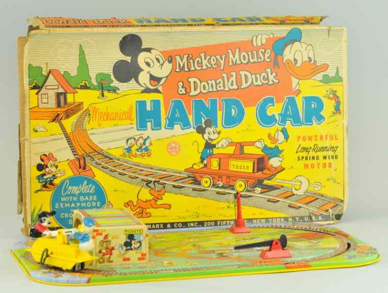 Appraisal: MICKEY MOUSE DONALD DUCK MECHANICAL HANDCAR Large boxed set includes