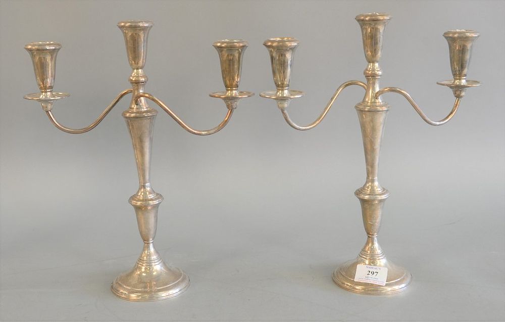 Appraisal: Pair of sterling silver convertible three light candelabra having scrolling