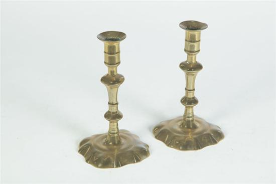 Appraisal: PAIR OF BRASS CANDLESTICKS Continental mid th century Seamed construction