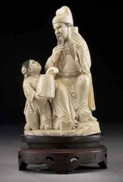 Appraisal: Chinese carved ivory figure group International buyers should note that