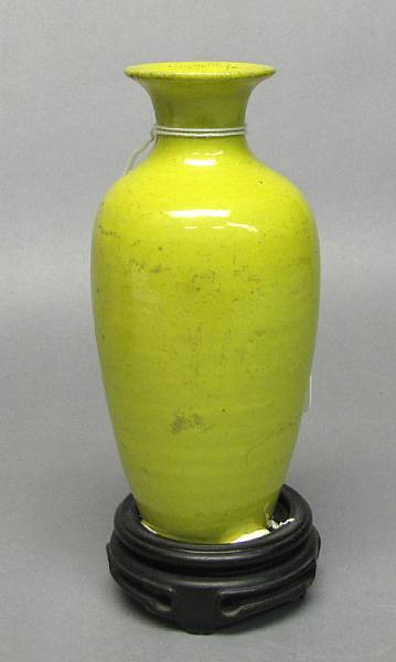 Appraisal: A small yellow glazed ovoid vase th Century Potted with