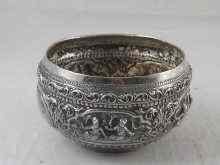 Appraisal: A white metal tests silver bowl with sharply embossed decoration