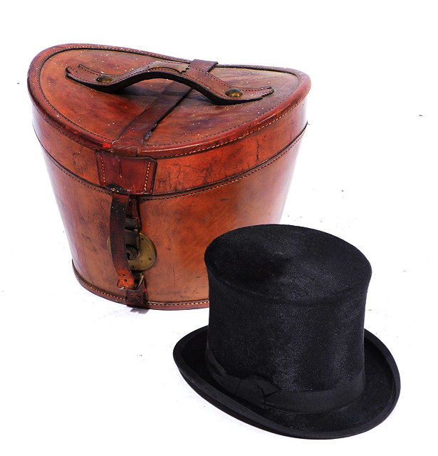 Appraisal: A BLACK SILK TOP HAT in an outer leather case