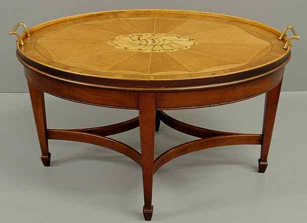 Appraisal: Mahogany Baker Furniture oval coffee table with extensively inlaid top