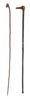 Appraisal: Two Hand Carved Riding Crops American th century including folk