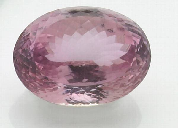 Appraisal: Pink Kunzite Brazil A large oval brilliant-cut stone suffused with