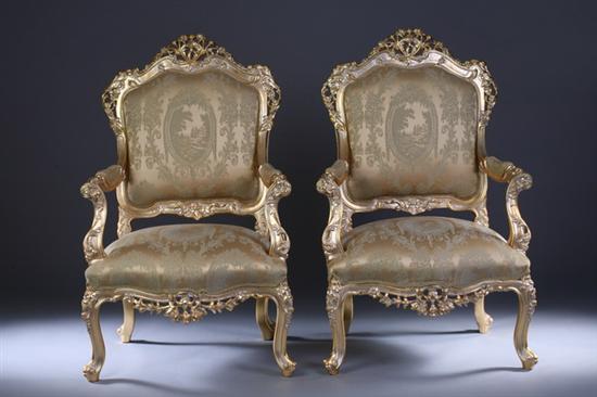 Appraisal: PAIR ITALIAN ROCOCO STYLE SERPENTINE GILTWOOD FAUTEUILS late th century