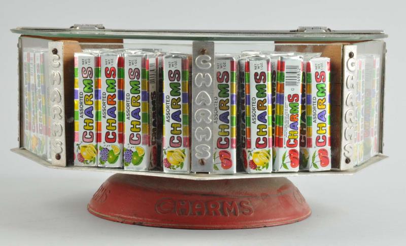 Appraisal: Charms Candy Rotating Display Case This glass rotating display is