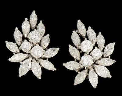 Appraisal: A Pair of Platinum and Diamond Cluster Earrings Mounted in