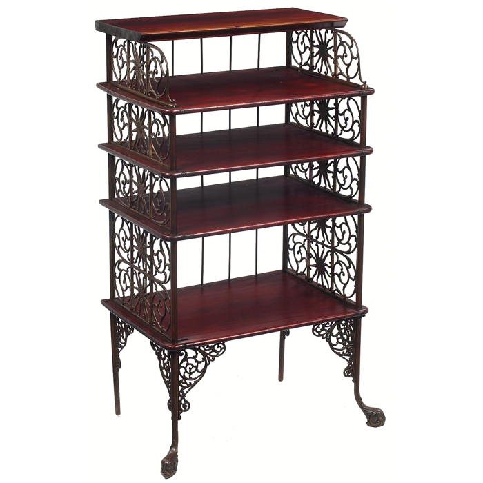 Appraisal: Arts and Crafts magazine stand in cherry unusual form with